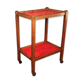 Serving in varnished chestnut and red leather