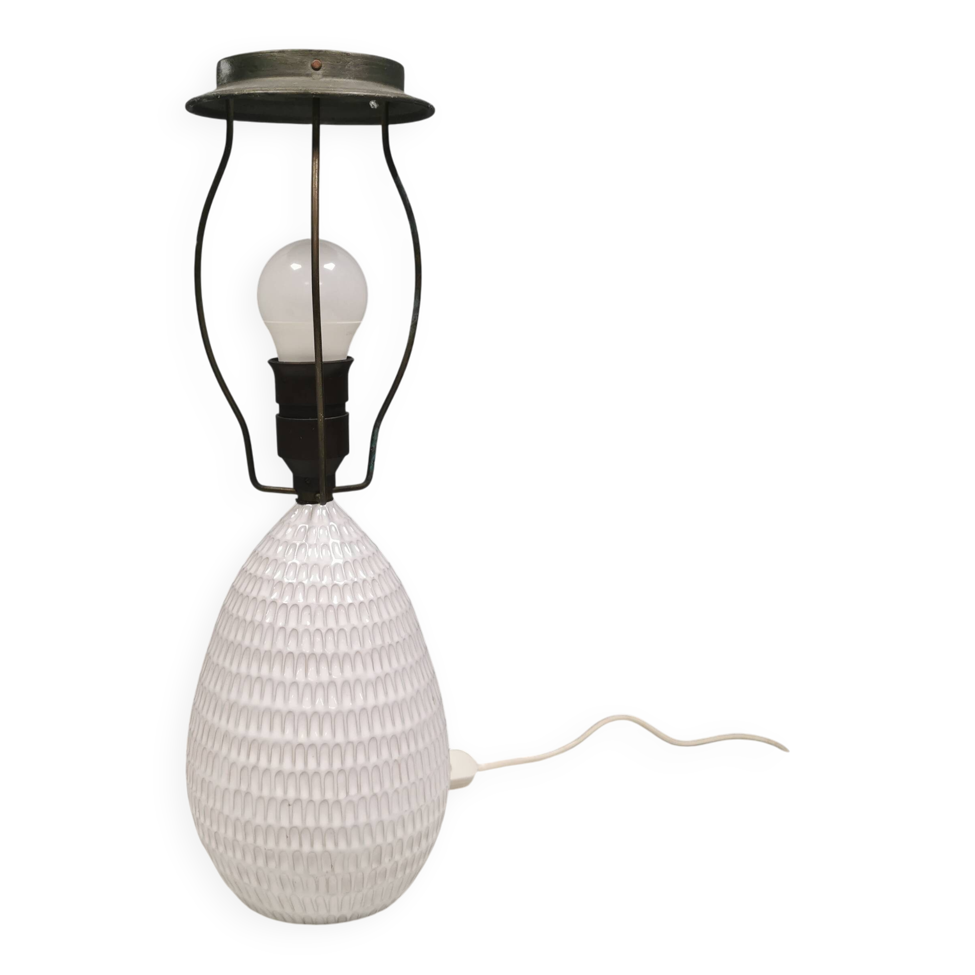 Older ceramic table lamp with beautiful details.