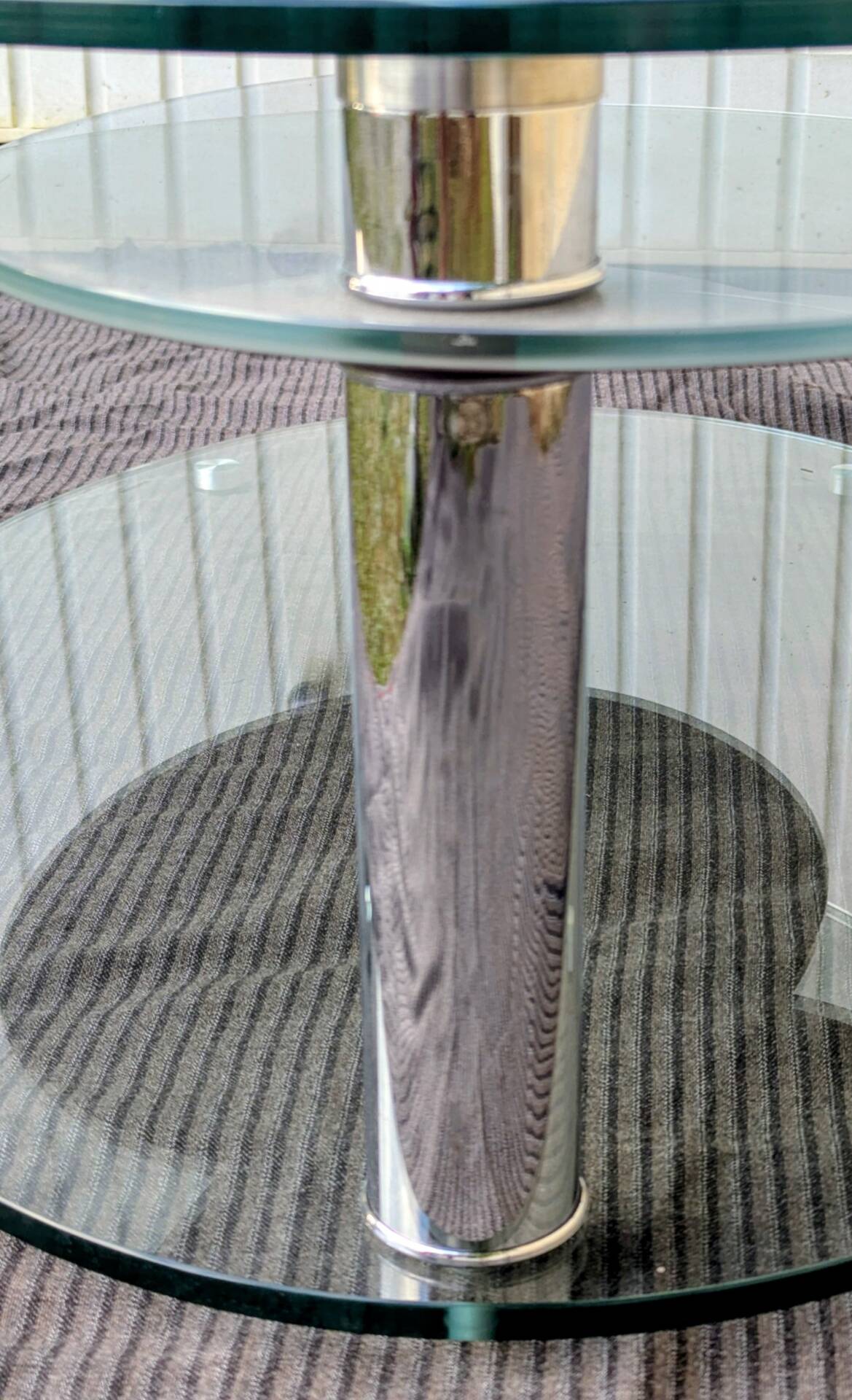 Coffee table with rotating glass tops by Antoine Motard.