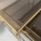 Set of three nesting tables in brass and smoked glass, 20th century