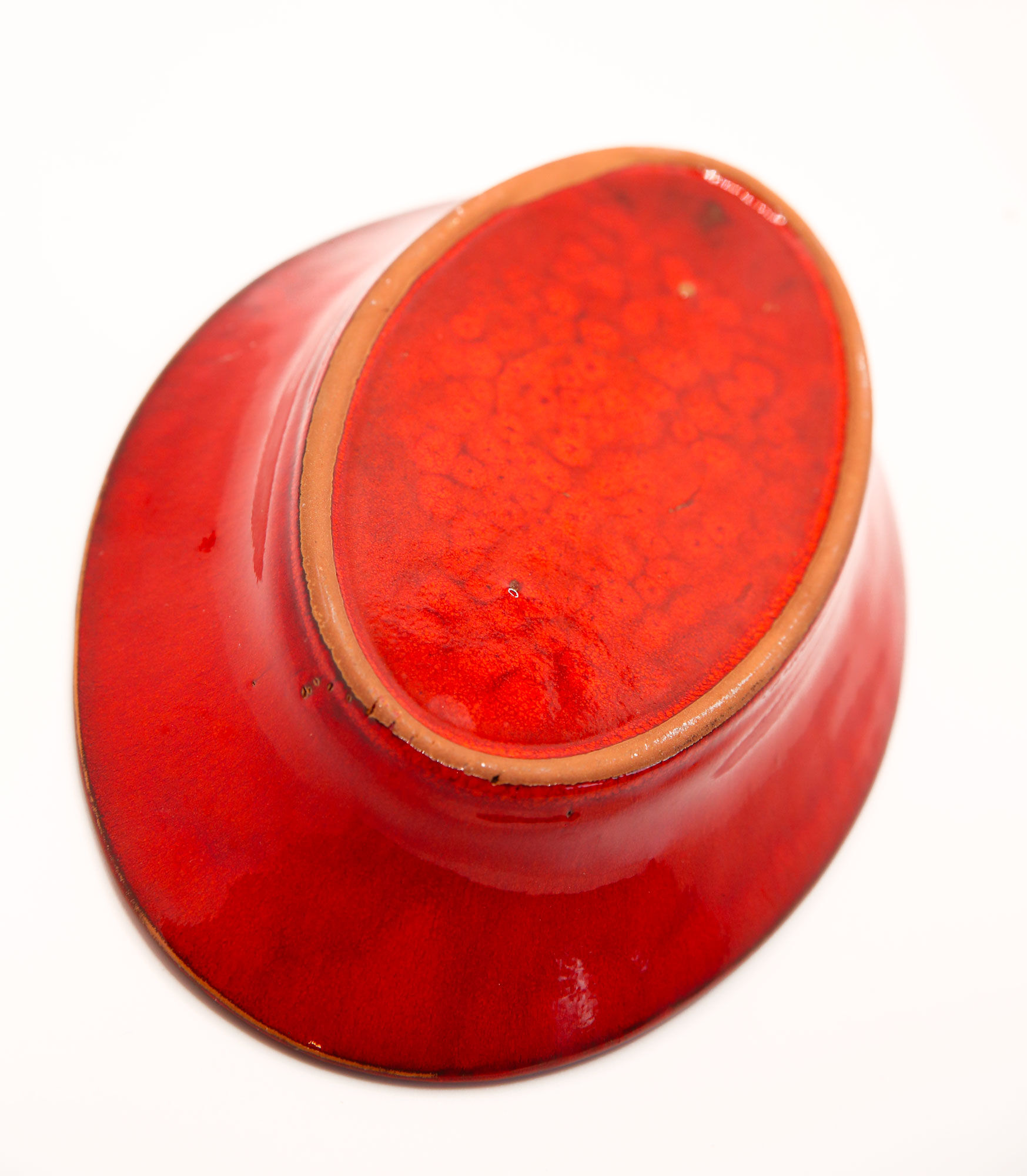 Handcrafted oval dish in scarlet red ceramic