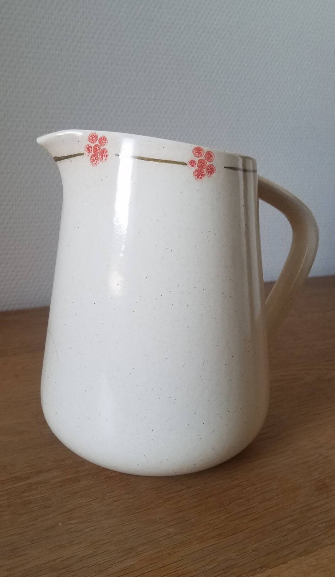 Hand-painted glazed ceramic pitcher