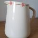 Hand-painted glazed ceramic pitcher