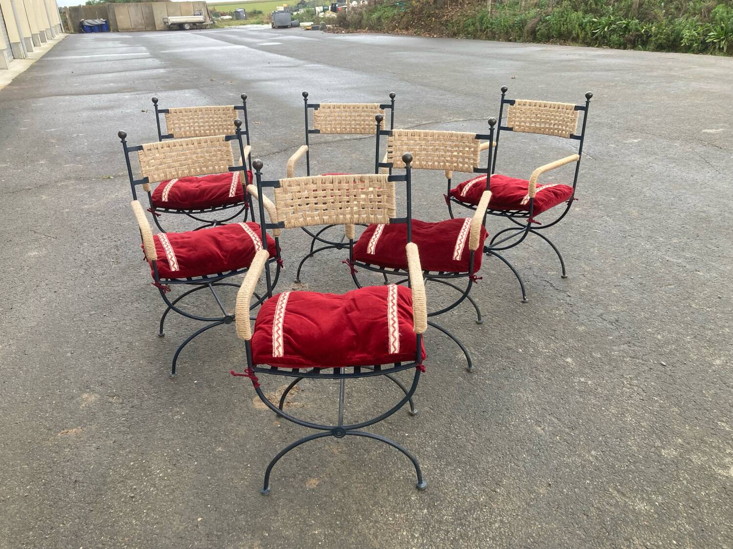 Six. Wrought iron armchairs, rope weaving.