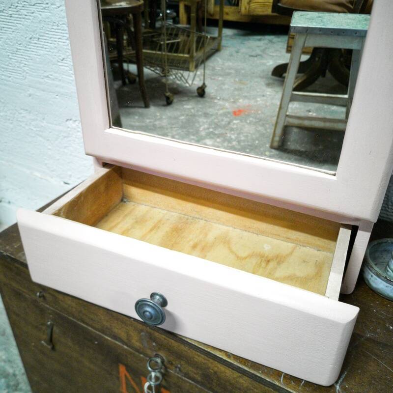Pink bathroom cabinet