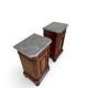 A pair of antique walnut bedside tables from the 1890s.