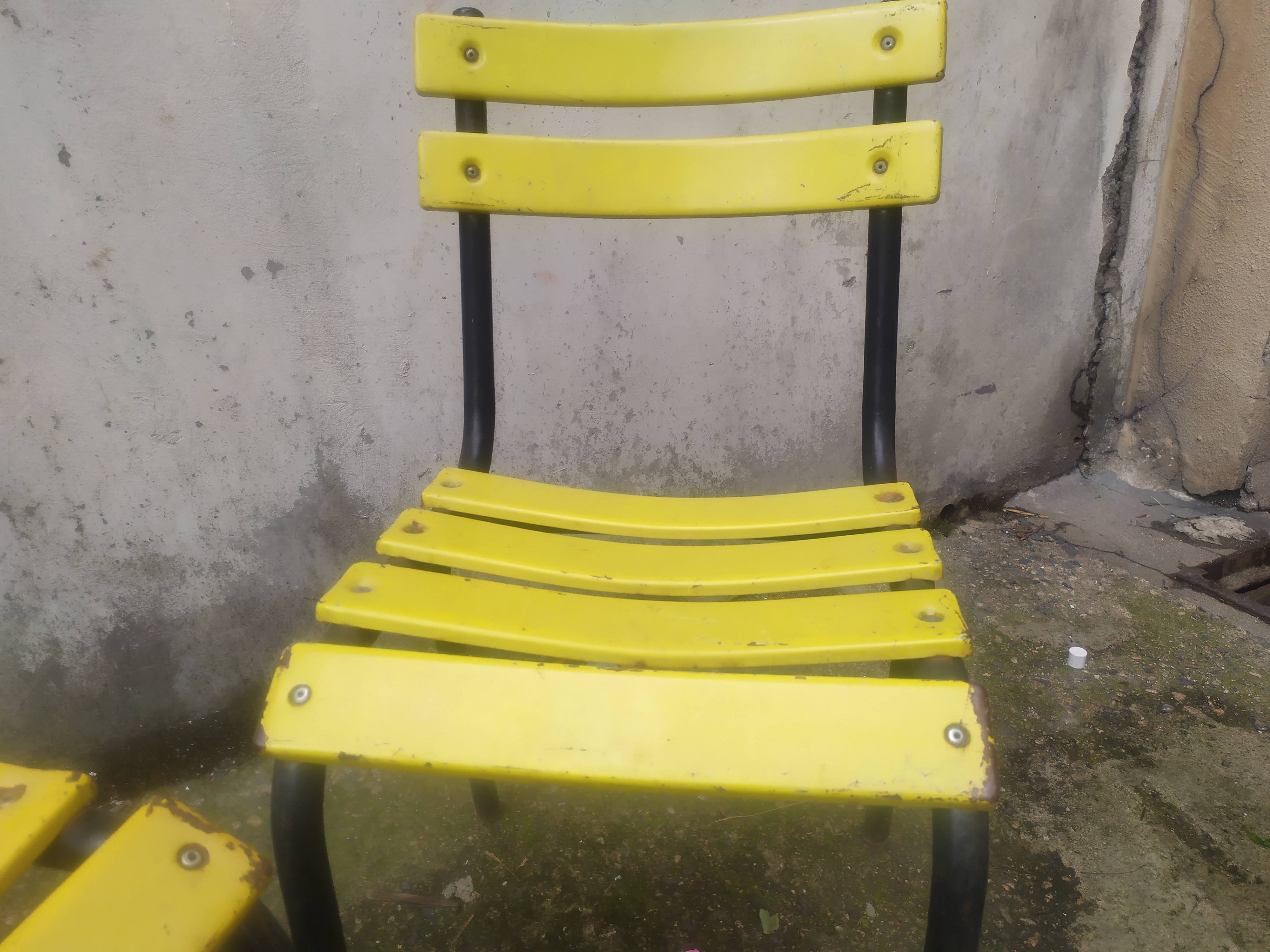 18 yellow metal bistro chairs
