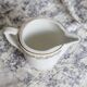 Vintage earthenware milk jug from Moulin des Loups – Gold floral motif