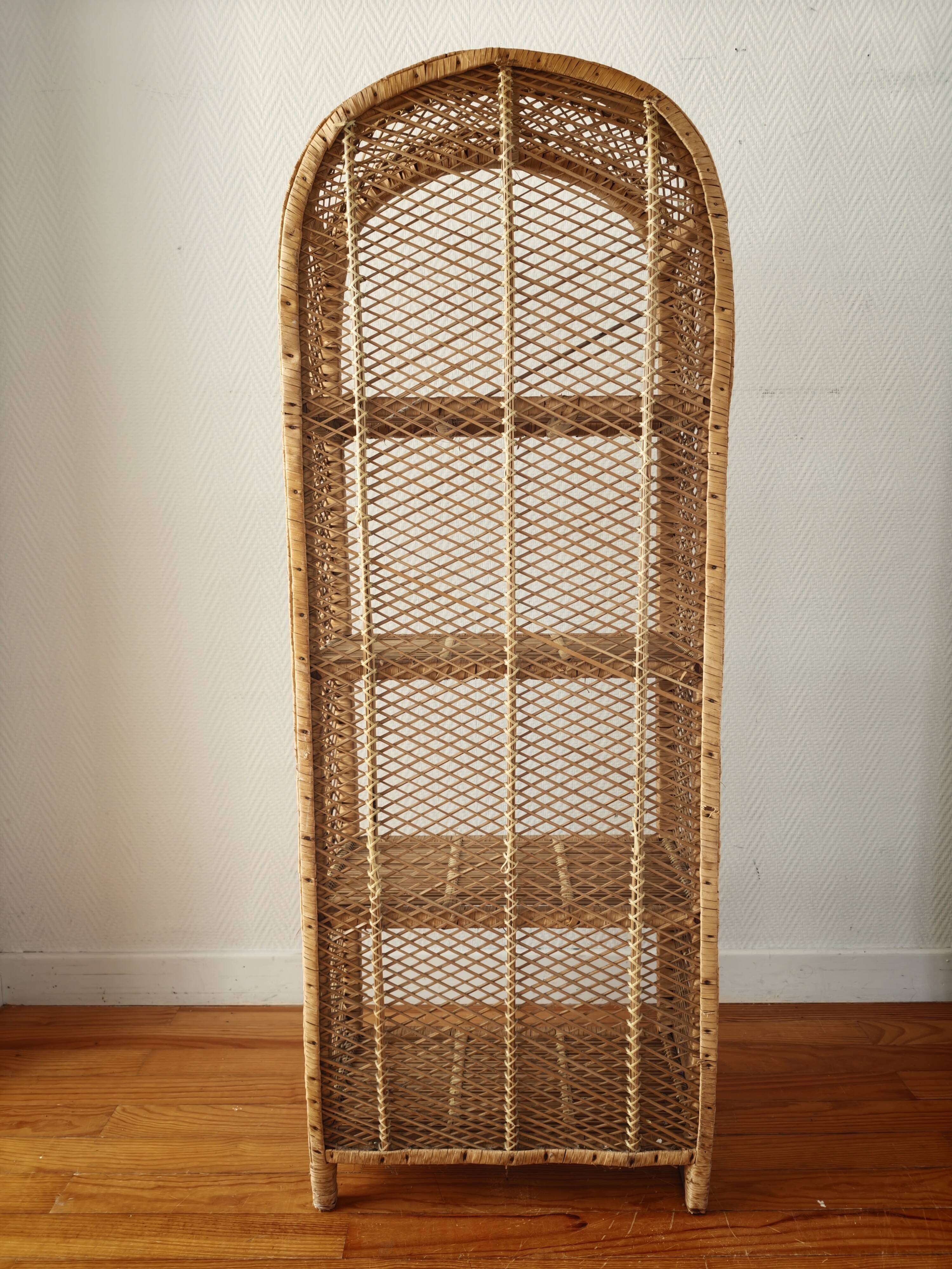 Rattan shelf on legs circa 1960