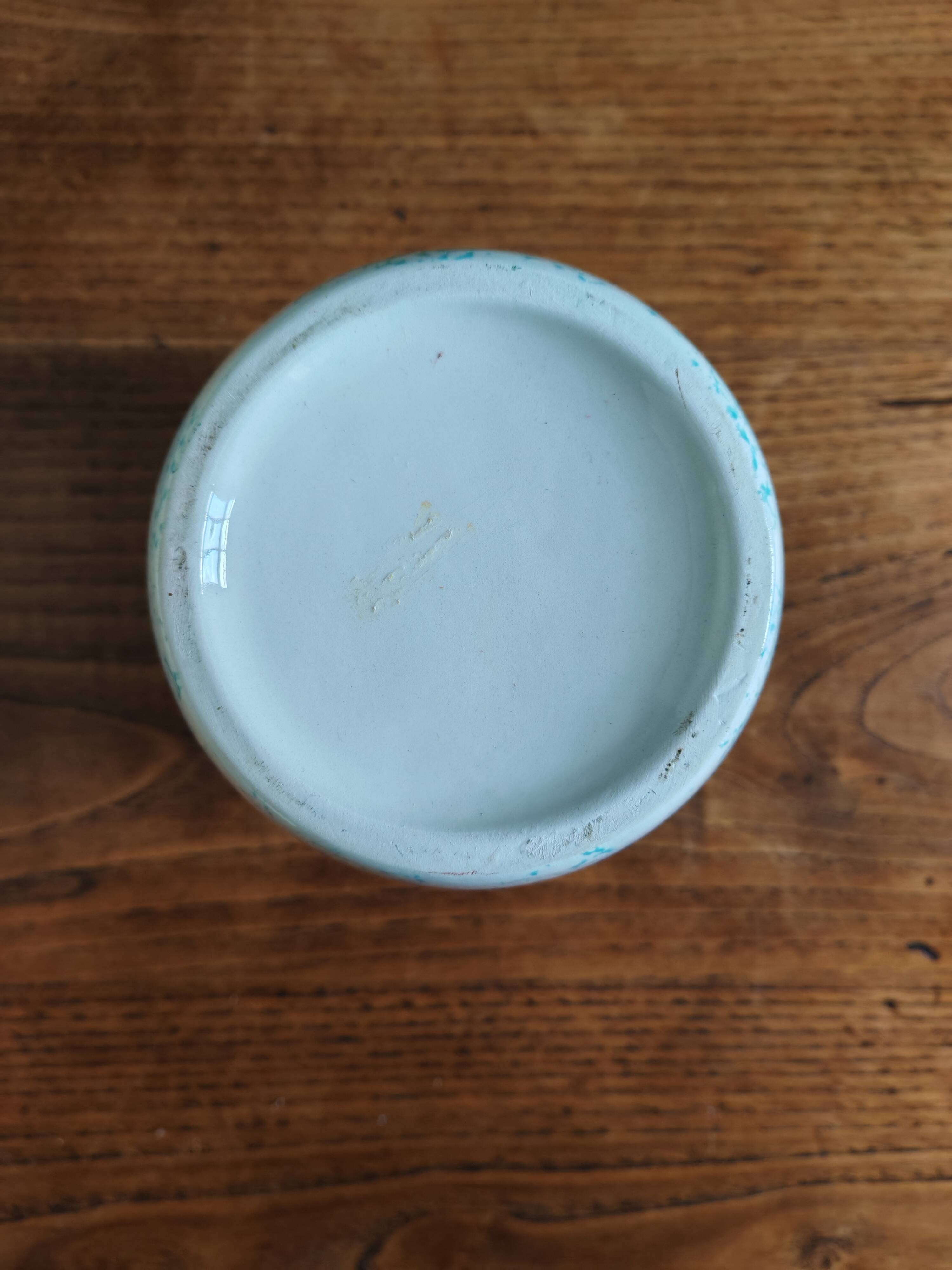 White Ceramic Vase with Peach and Leaf Motifs