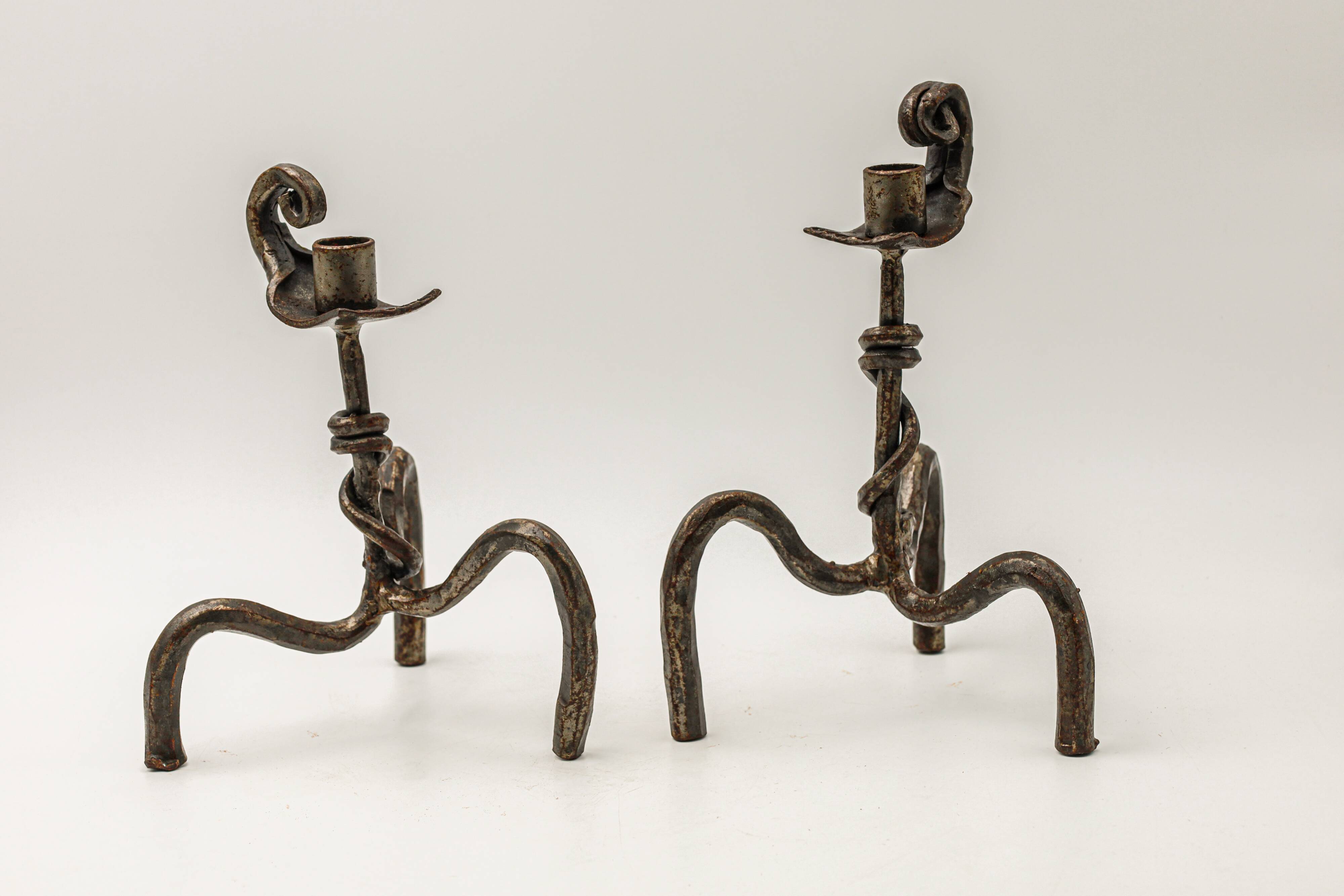 Pair of brutalist wrought iron candlesticks, French work, 1950s-1960s