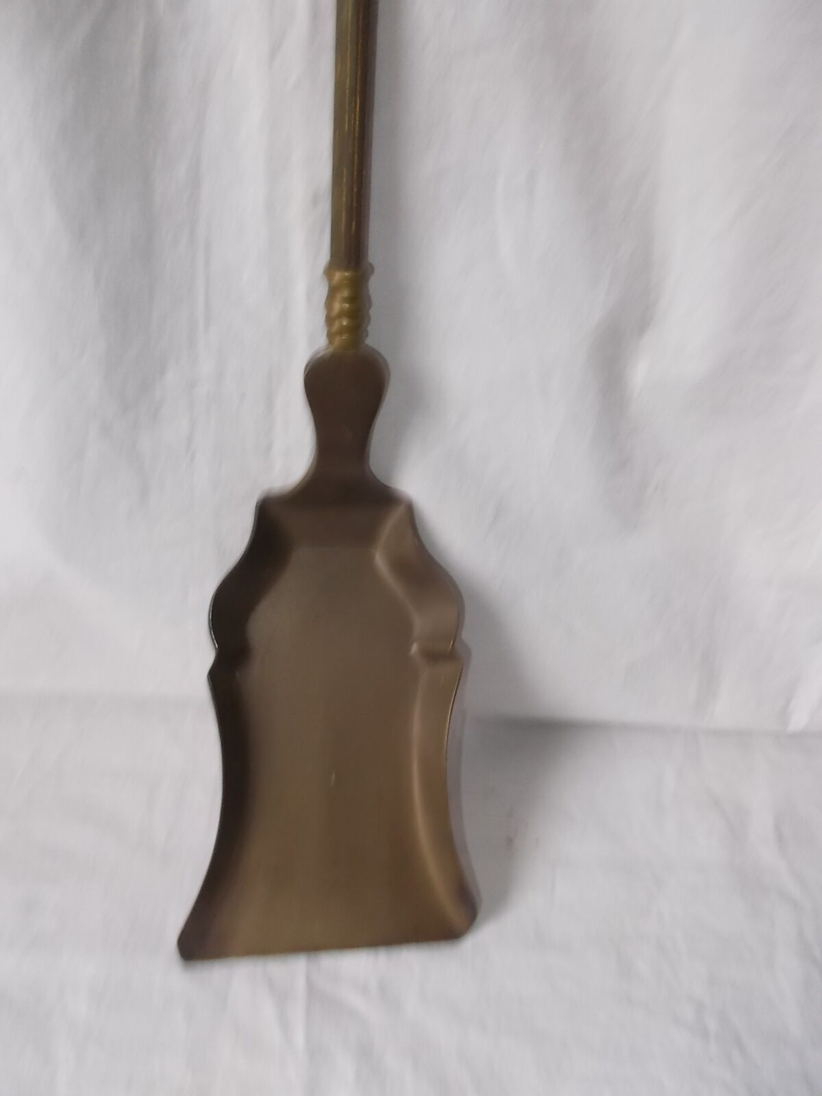 Shovel for the old brass fireplace