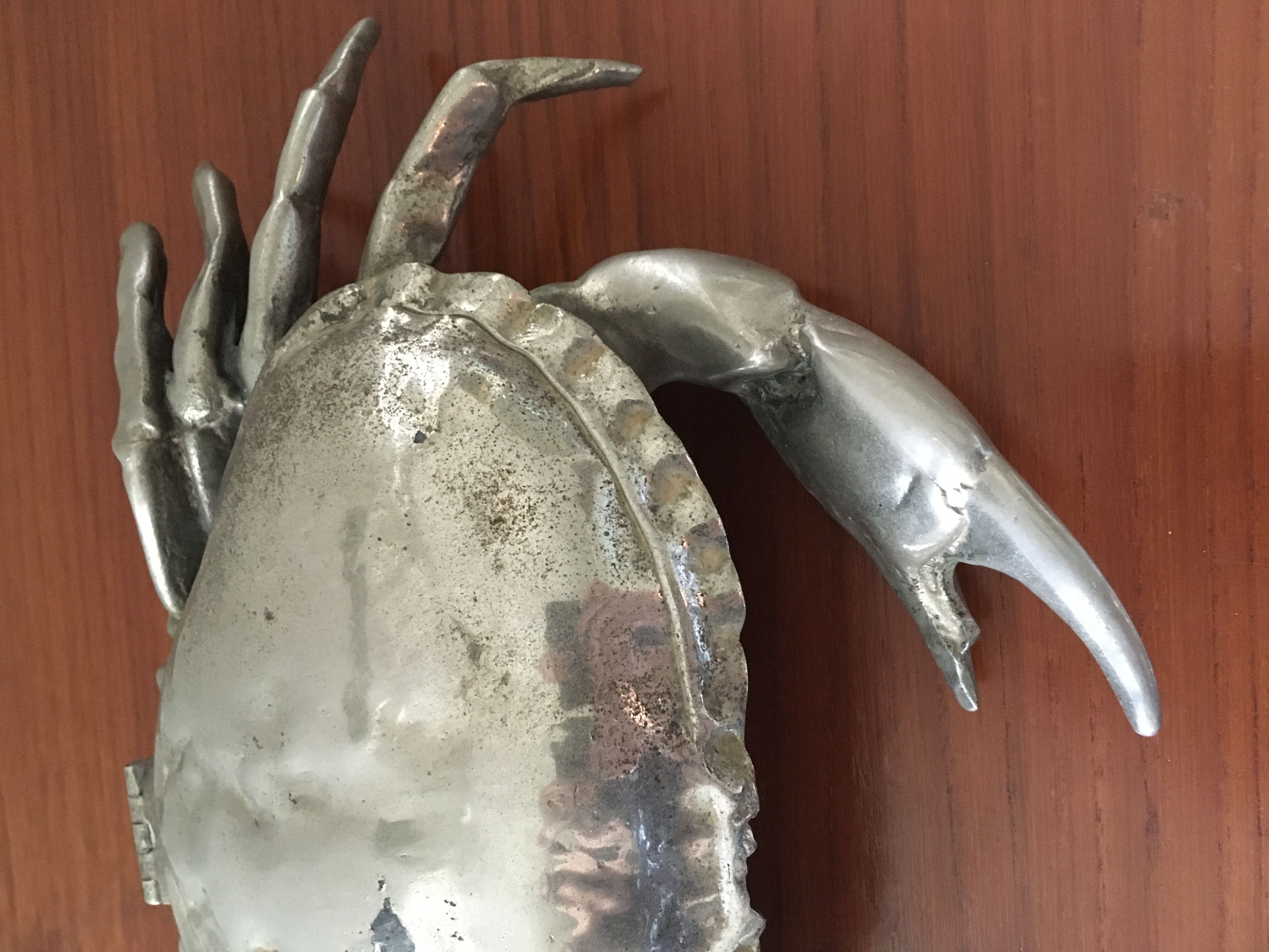 Silver metal box in crab shape