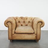Chesterfield armchair made of cowhide leather in a light cognac colour