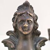 Pair of bronze andirons with black patina, 19th century, female caryatids