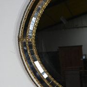 Miroir ovale à parclose en laiton, style hollywood regency – 1970