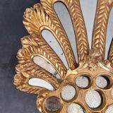 Palm-shaped faceted mirror