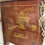 Louis XV style commode in red lacquer from the 1900s.