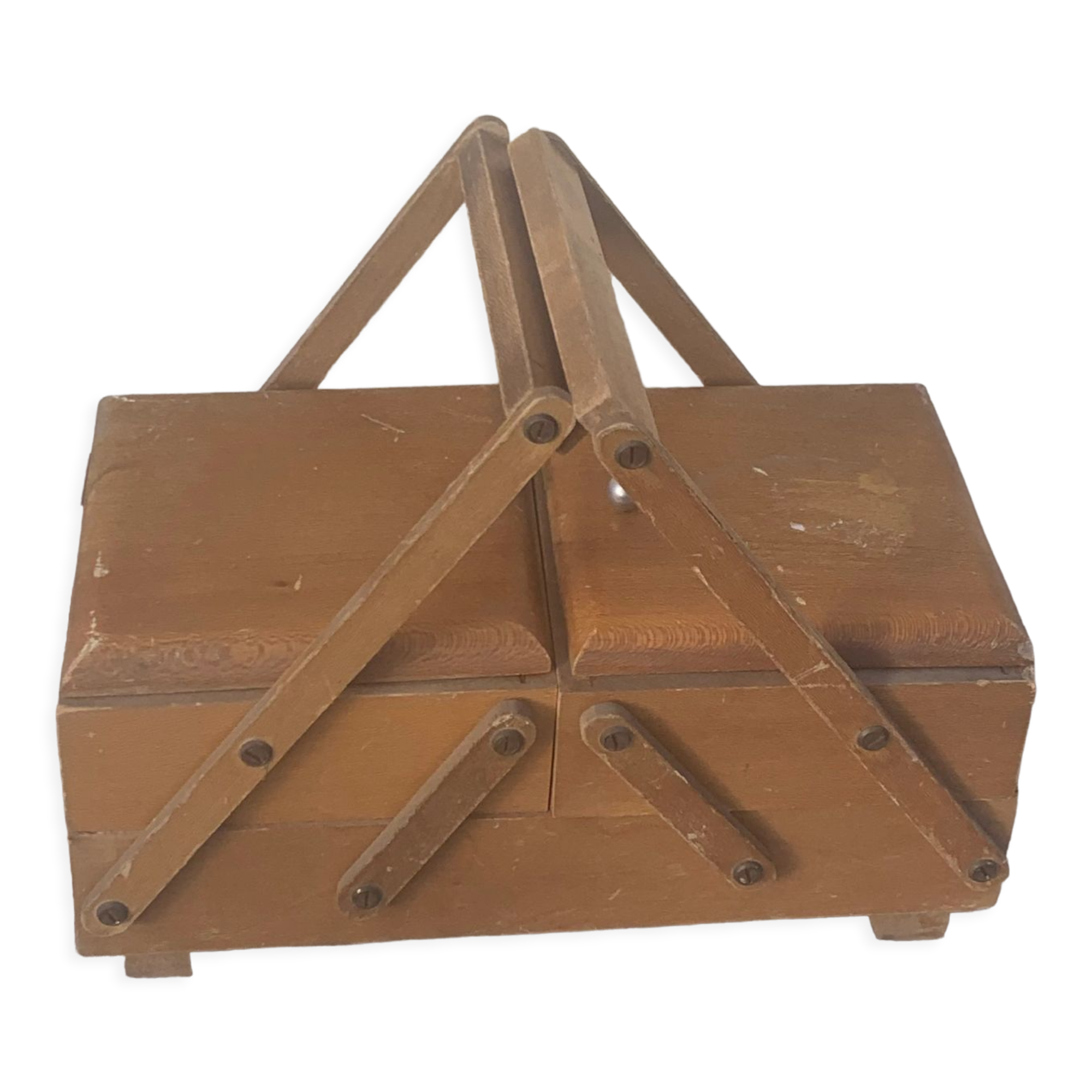 Sewing box in old varnished wood