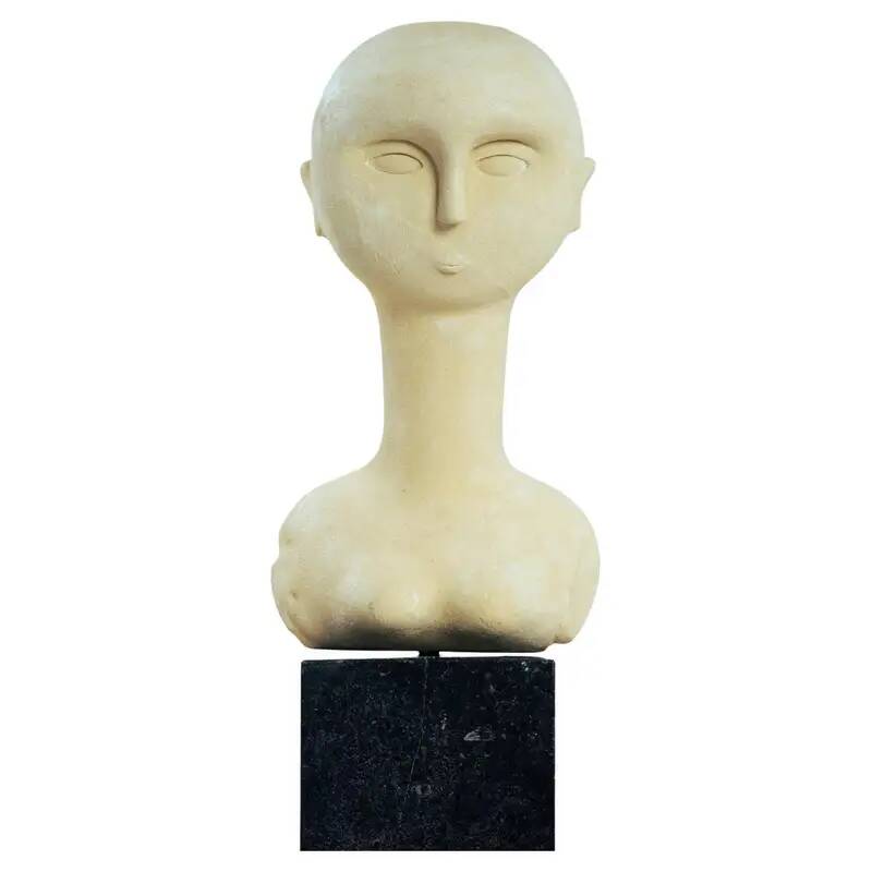 Modernist bust sculpture of a woman in sandstone