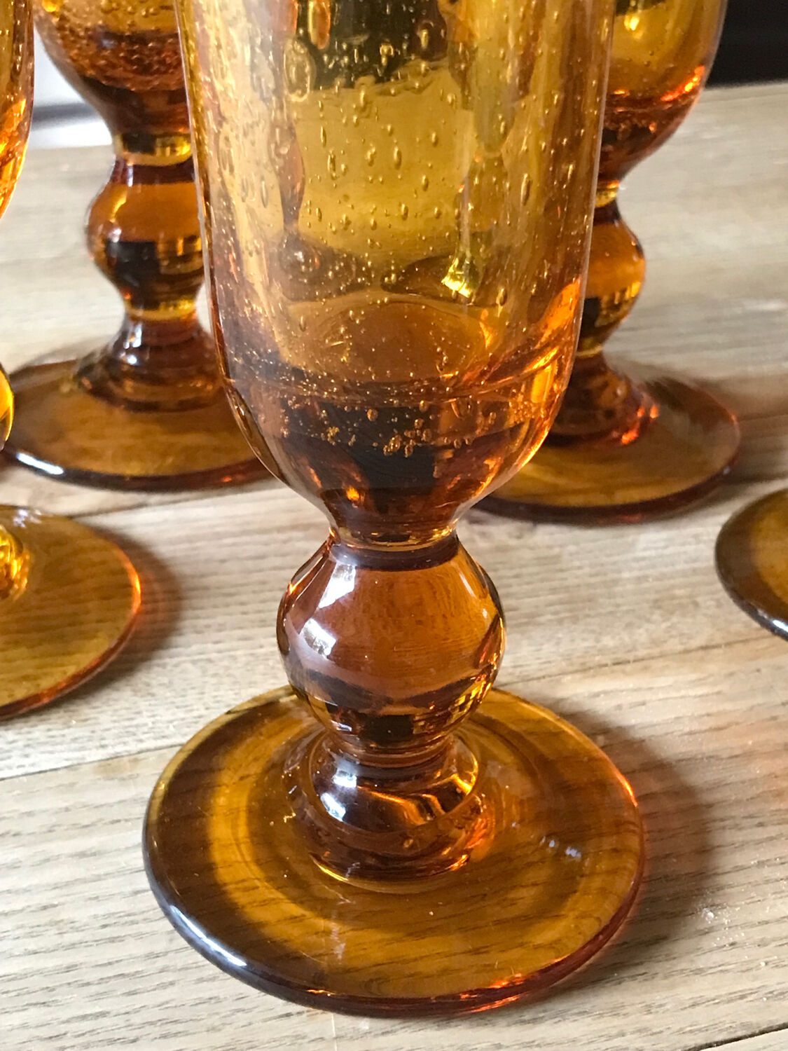 Champagne flutes bubbled amber blown