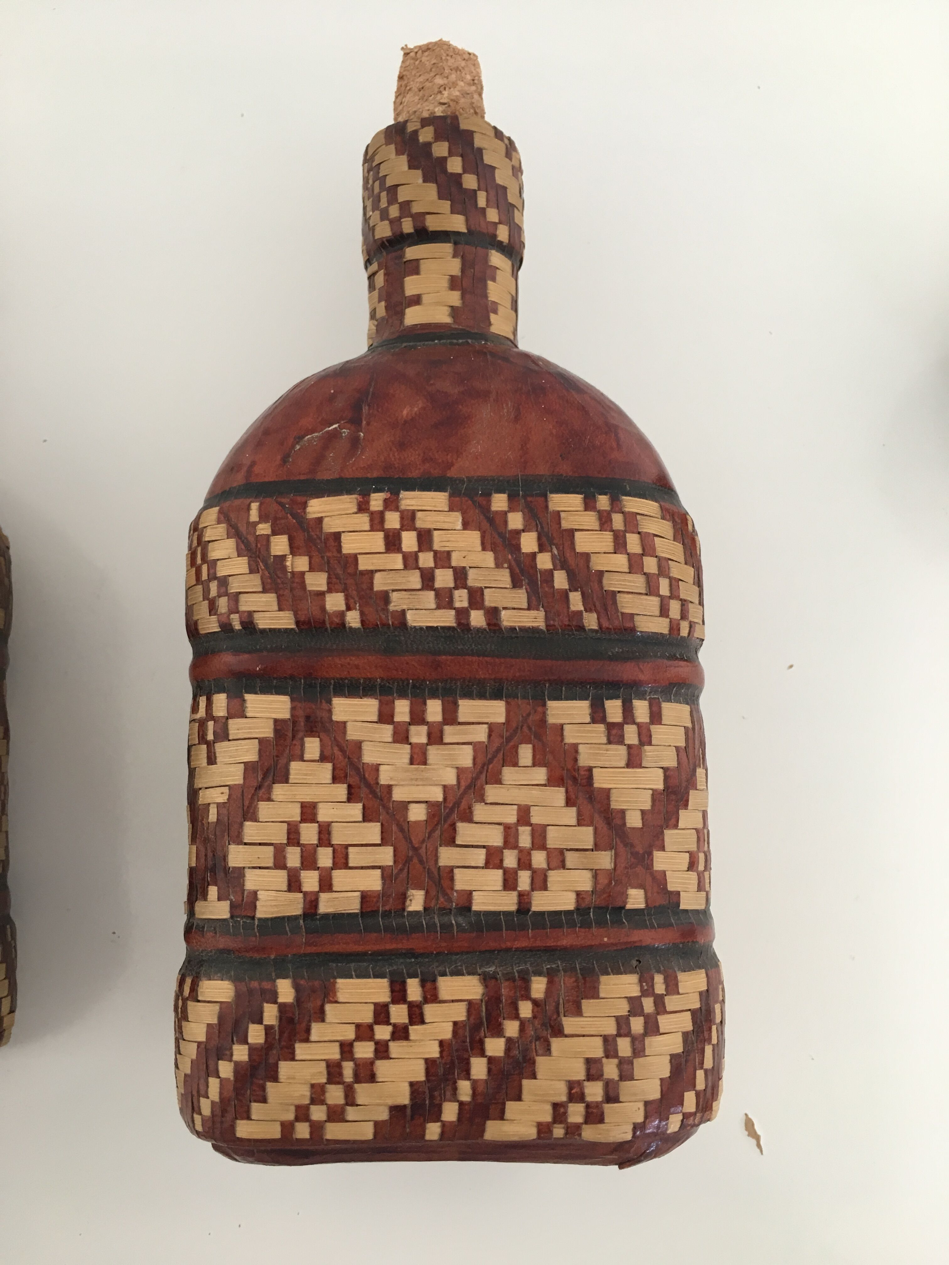 Lot of 2 ethnic leather-wrapped bottles and box