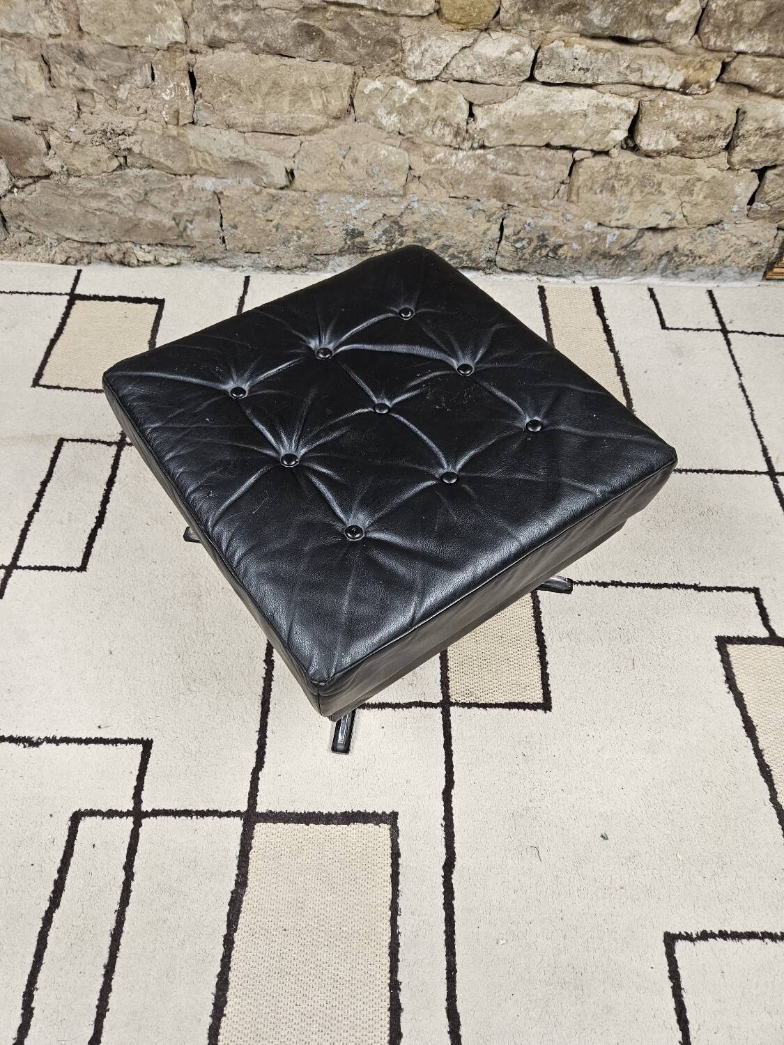 Black leather ottoman 1970 vintage