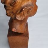 Bust of a laughing child in patinated plaster, 35 cm