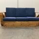 Sofa rectangulaire en rotin à six brins exclusif pour trois places, d'après Paul Frankl, années 50.