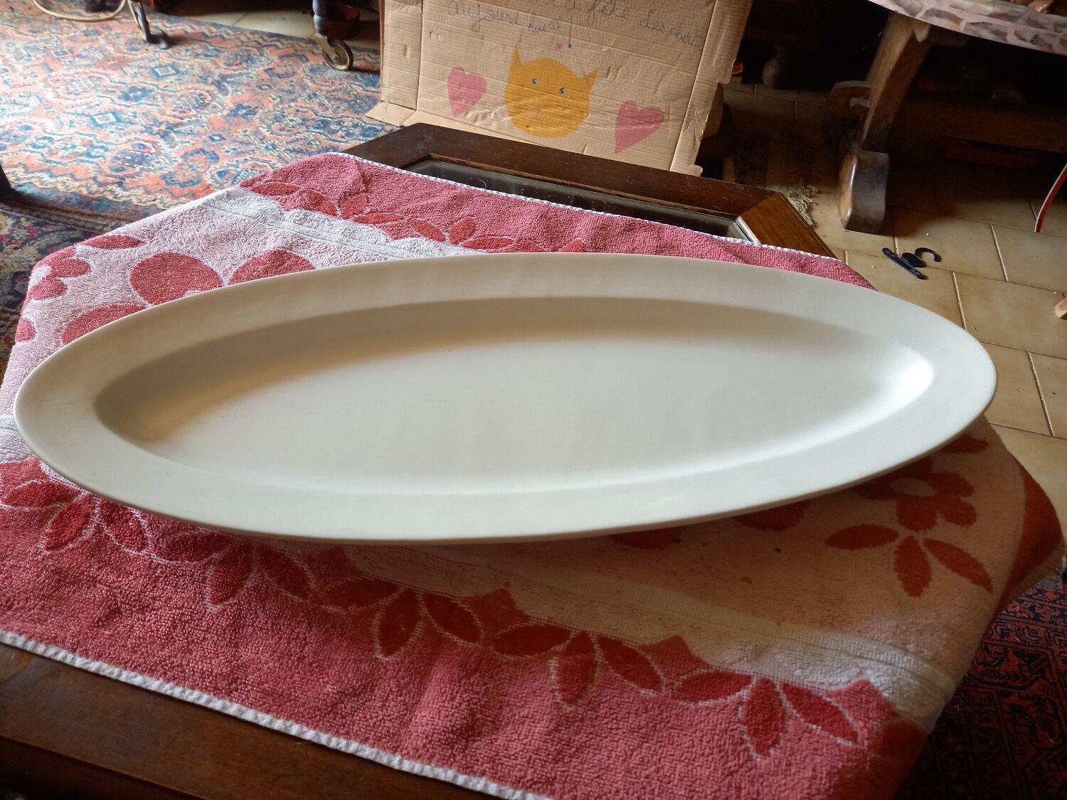 Old white earthenware fish dish
