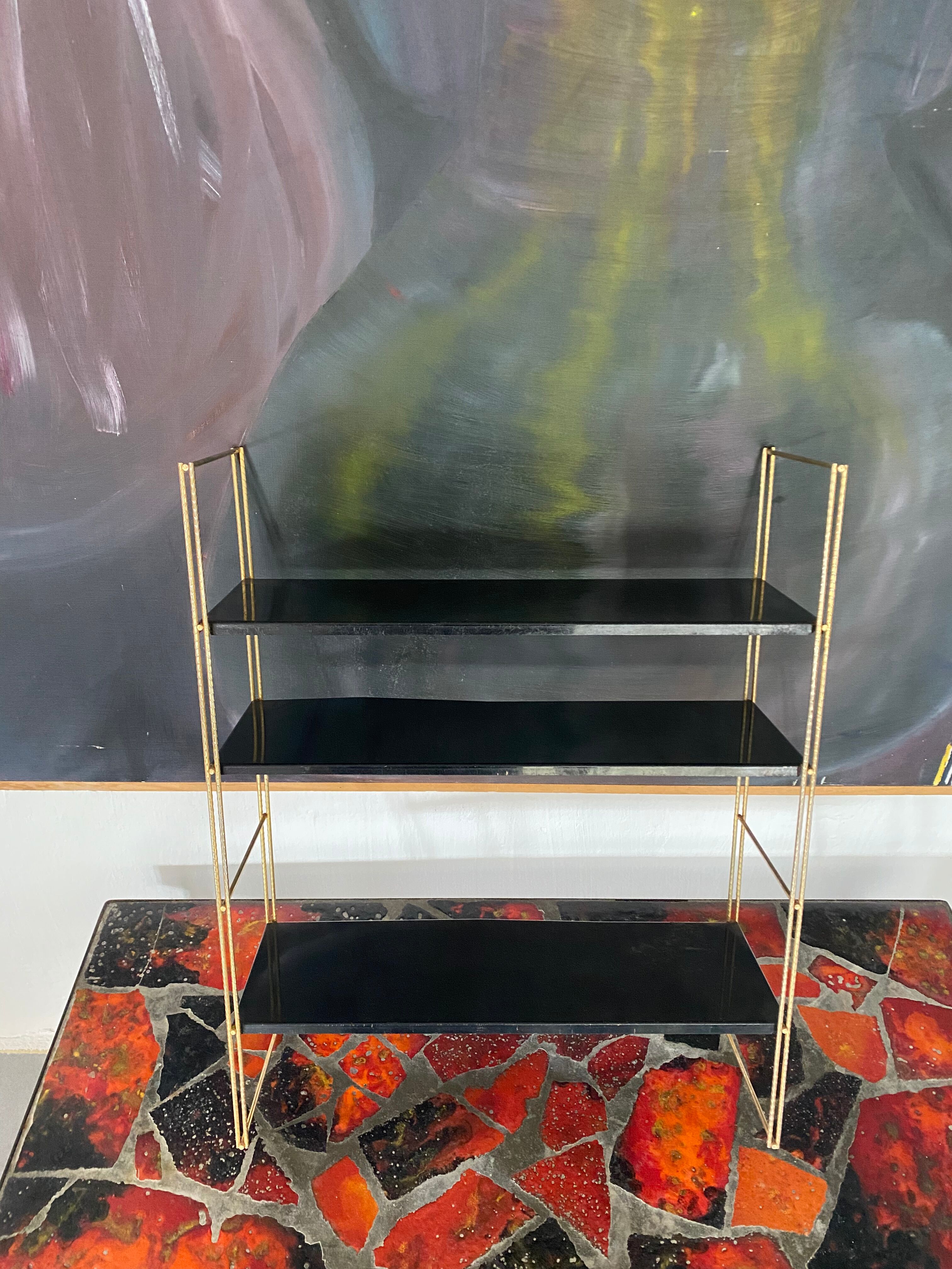 Vintage metal string shelves