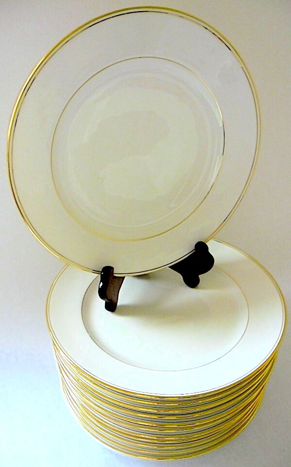 Twelve plates of Limoges porcelain tables