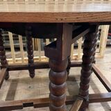 Wooden table with gateleg flaps