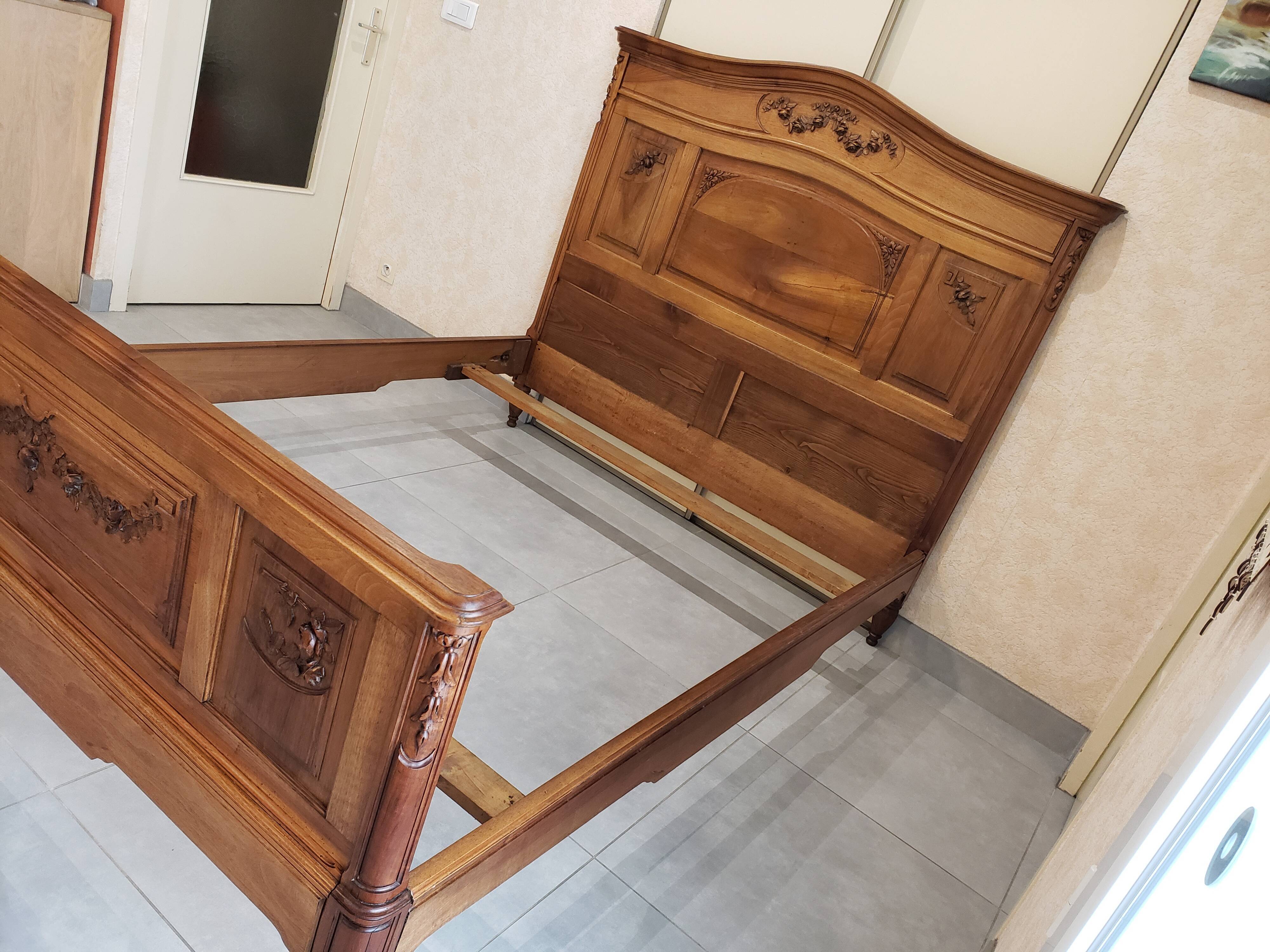 Vintage old walnut bed carved late nineteenth century