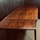 Table extensible en palissandre danois du milieu du siècle.