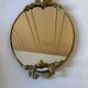 Elegant old oval mirror