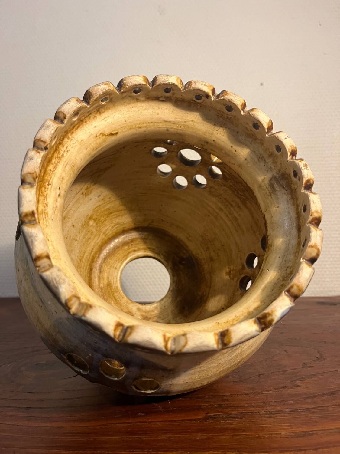 Ceramic suspension with openings