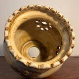 Ceramic suspension with openings