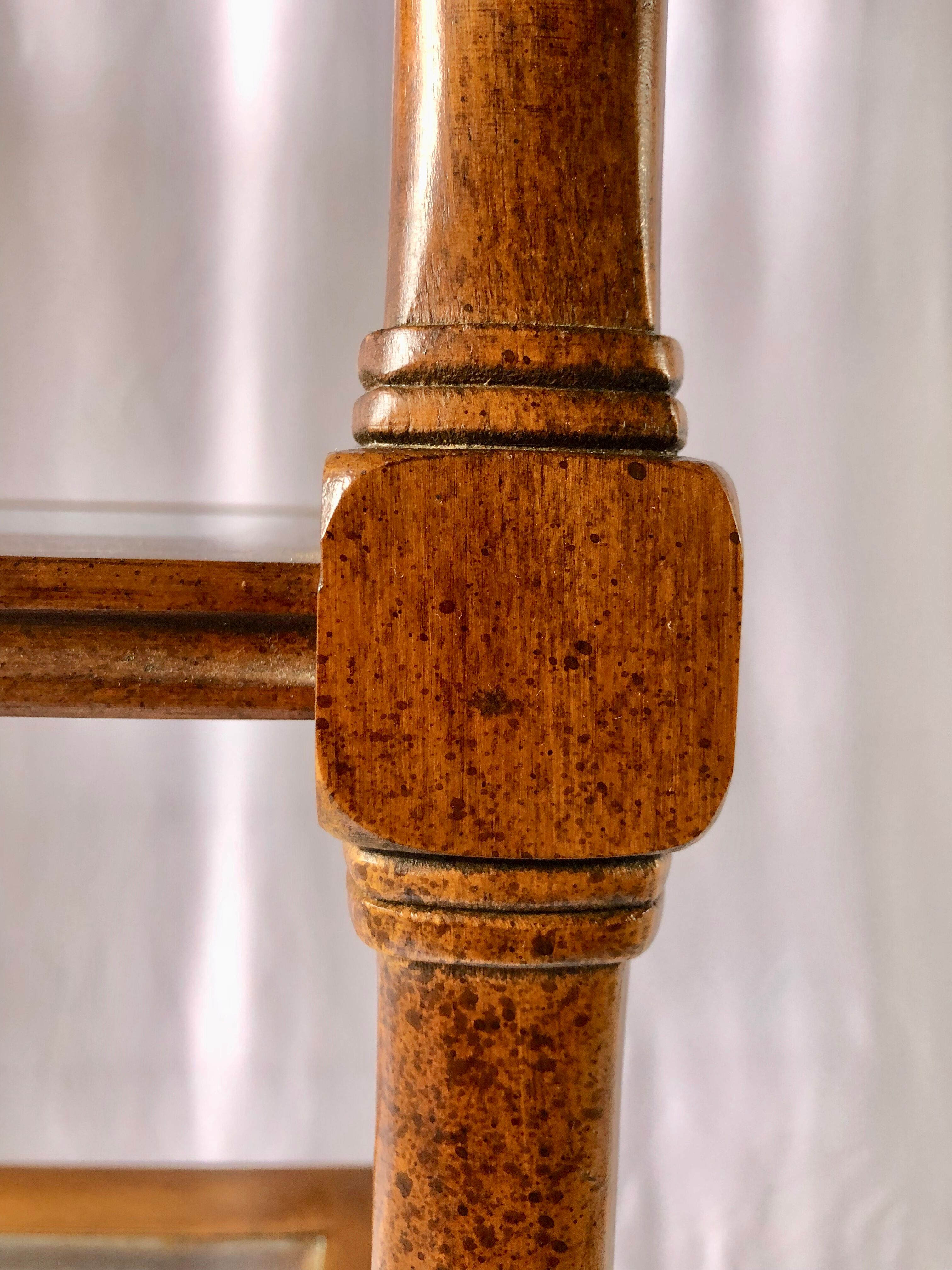 Classic wooden shelves, glass tops and cannage