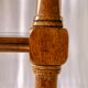 Classic wooden shelves, glass tops and cannage