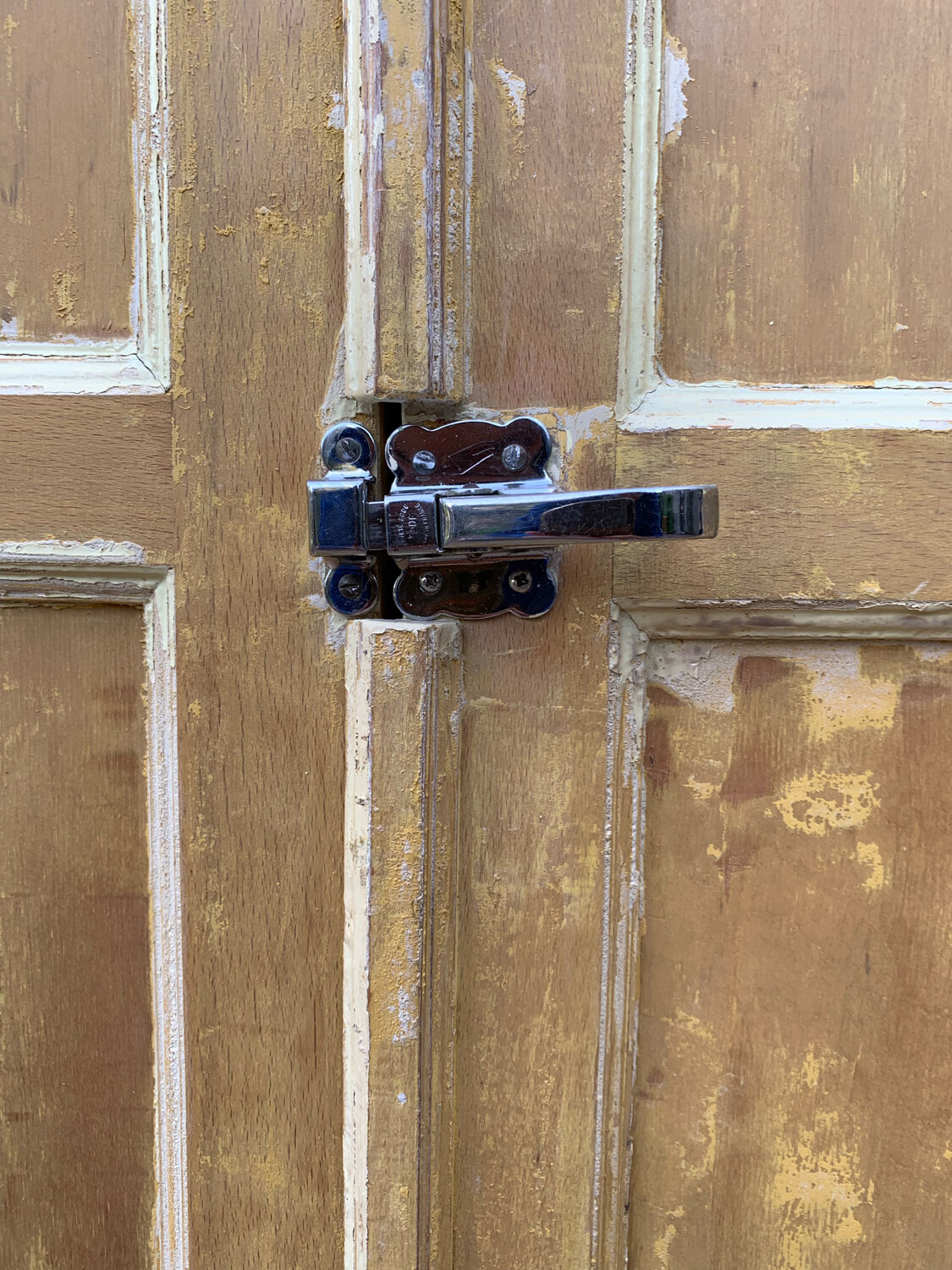 Parisian wardrobe in patinated wood