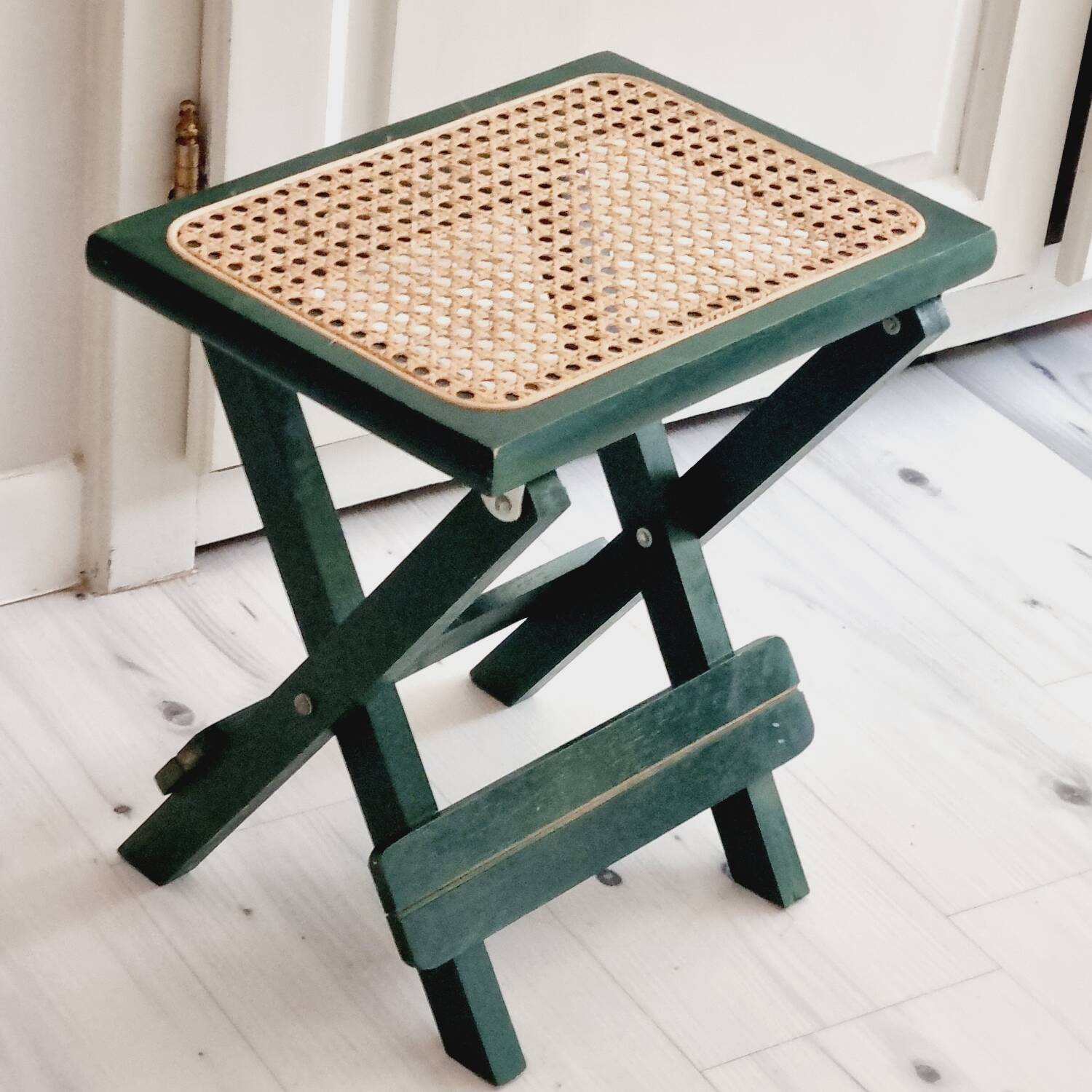 Small folding stool in green wood and cane