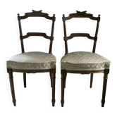 Paire de chaises volantes de style Louis XVI