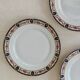 Set of 7 flat plates in Limoges porcelain
