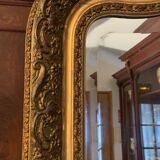 Golden mirror with bevelled ice pediment in Regency style