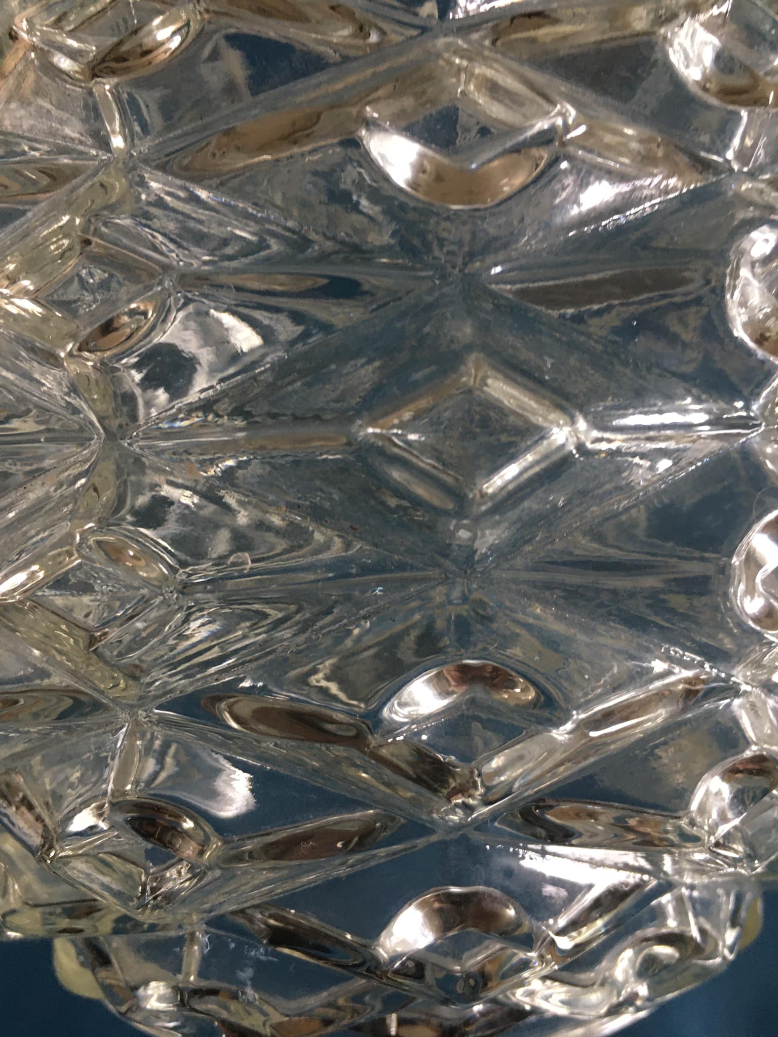 Round art deco globe in worked white glass