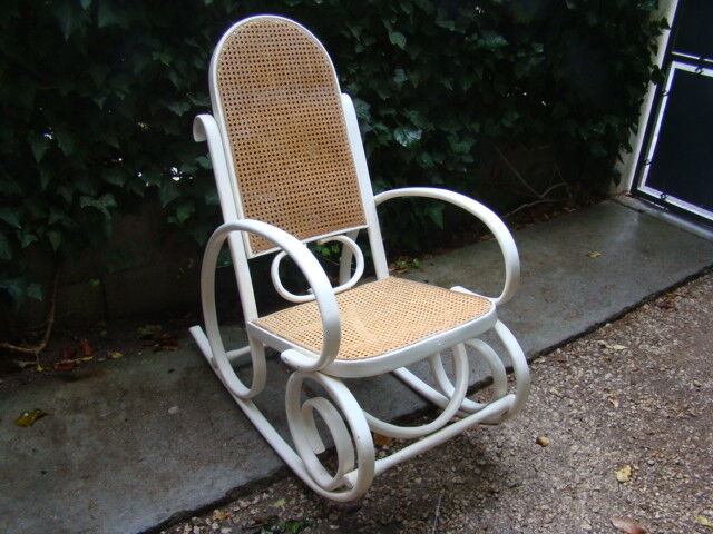 Antique caned rocking chair