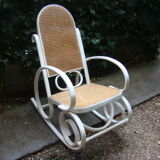 Antique caned rocking chair