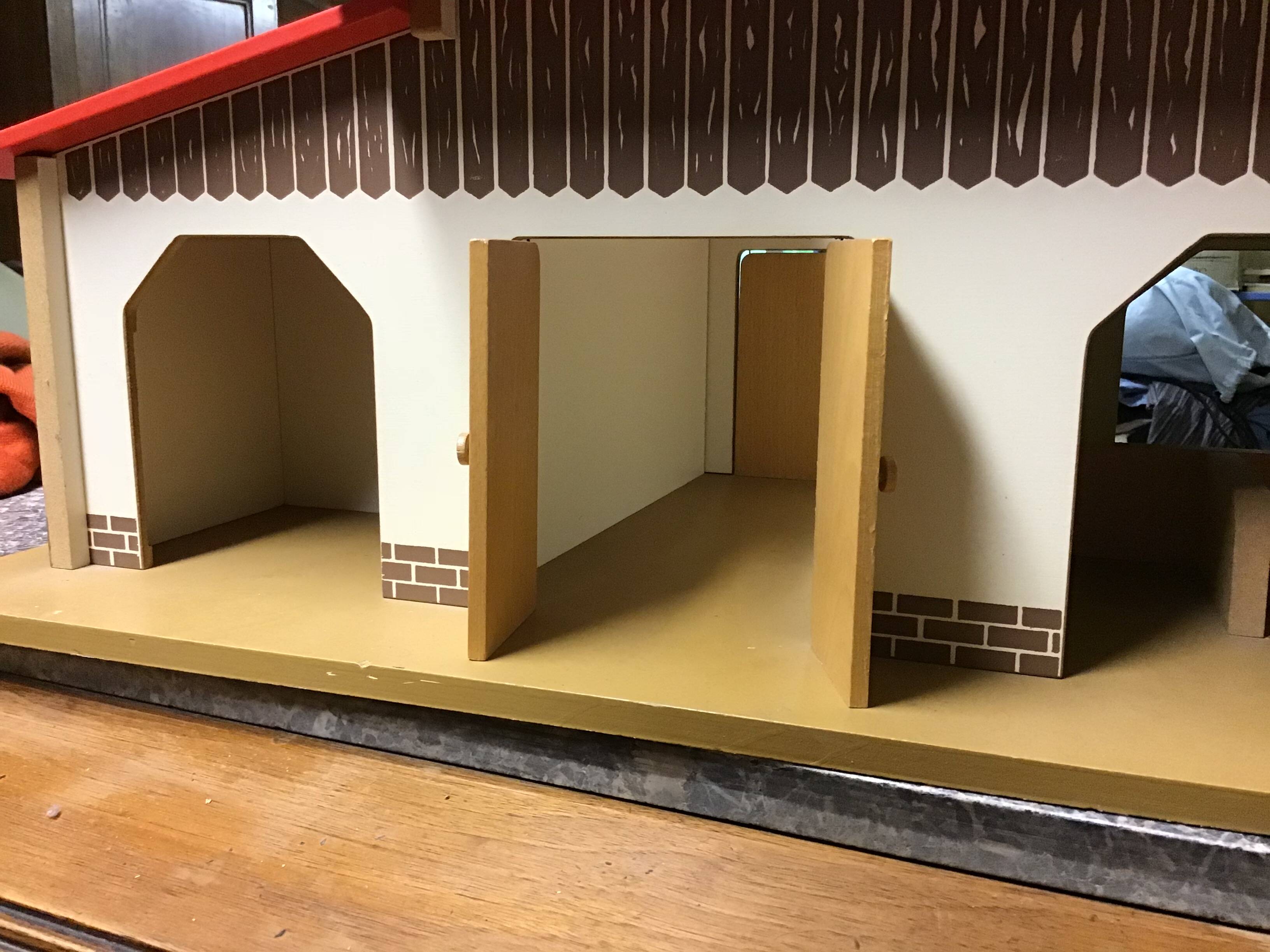 Wooden farm for children with animals.