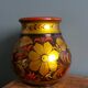Khokhloma vase, Russian lacquered wood craftsmanship, hand-painted floral decoration.